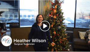 Heather Wilson, a surgical technician at Elite LASIK & Cataract in Indianapolis, is announcing the winner of the patient referral sweepstakes.